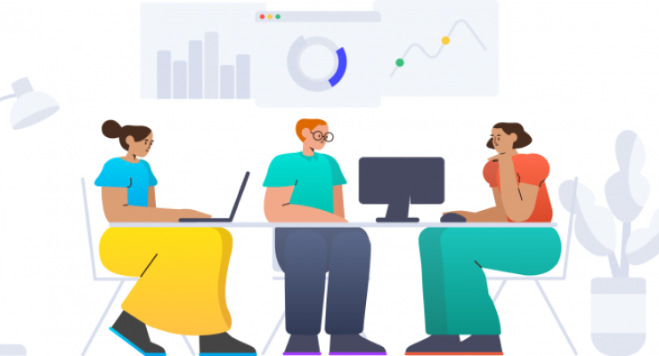 Three employees discussing marketing strategies and charts